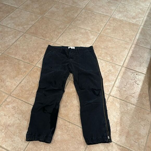 Nili Lotan Denim - Nili Lotan woman's black cargo pants cuffed at the bottom